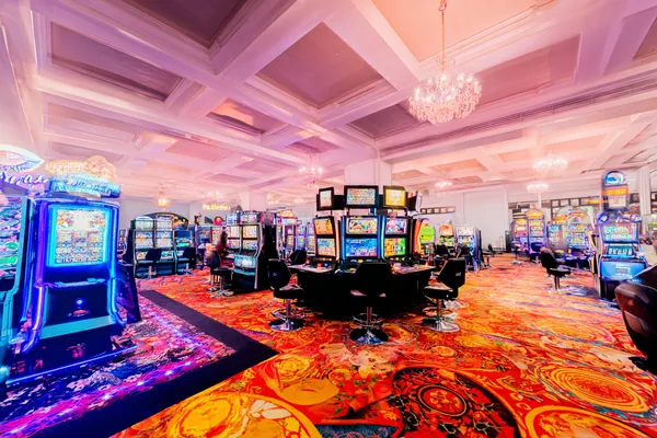 A laptop glowing with a bright login prompt in a minimalistic setup, symbolizing the protected access system at ZS999.